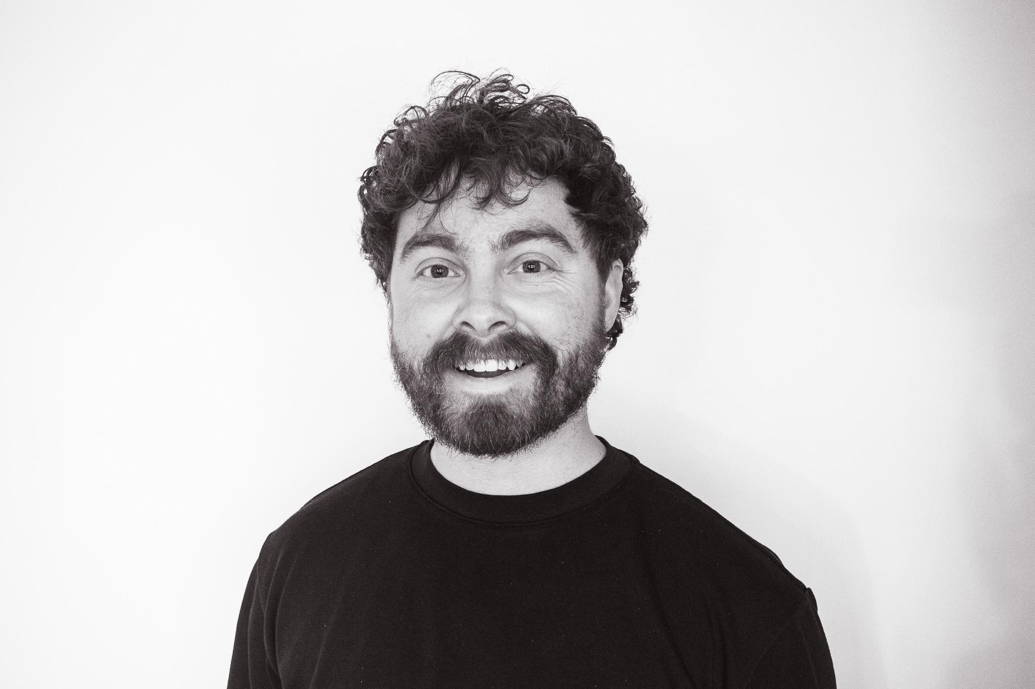 Headshot of Thomas Emerson, Product Designer