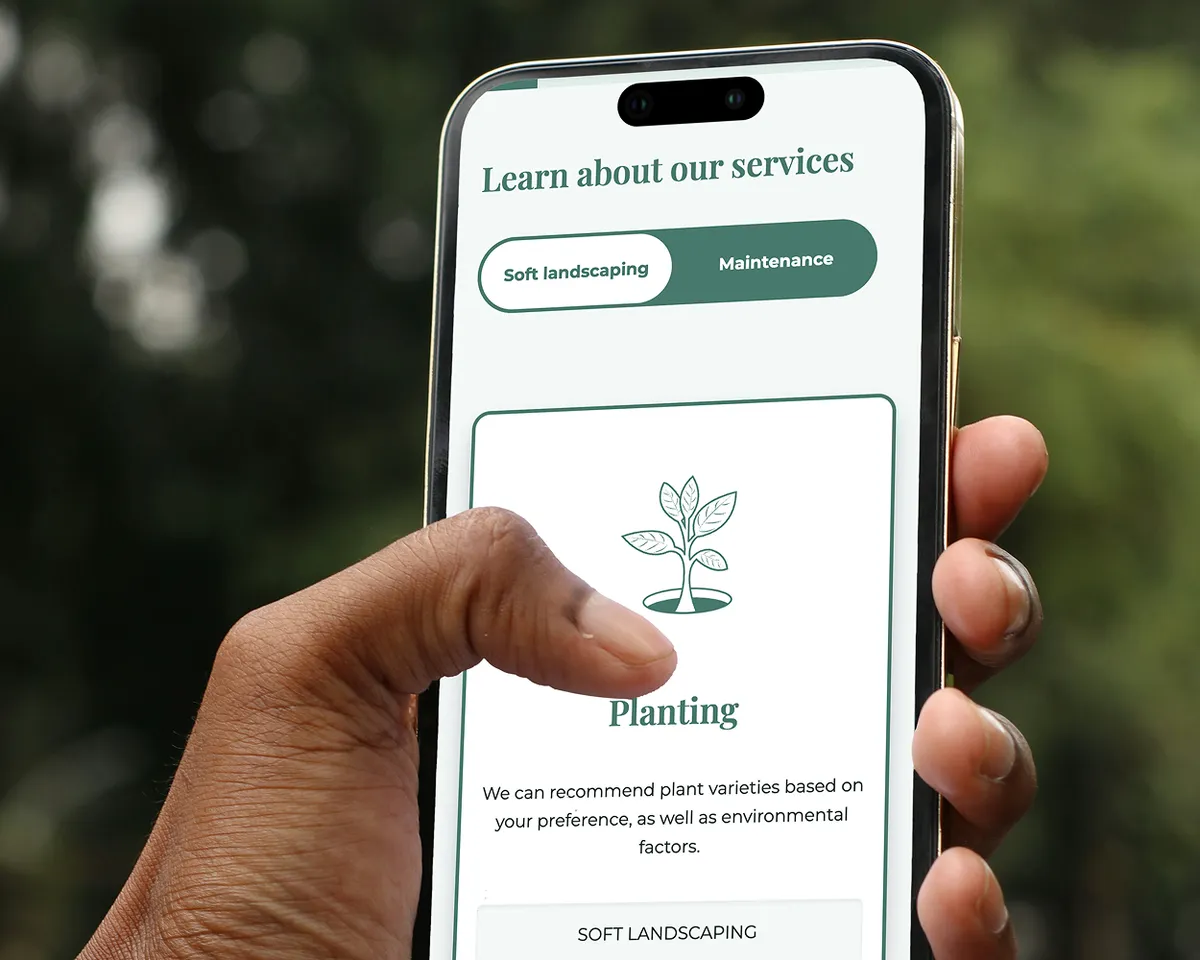 A user browsing the landscaping business website on a laptop, showcasing the site’s clean design and easy navigation.